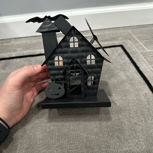 Mini metal haunted house tea light candle holder. Perfect condition. Never used!
